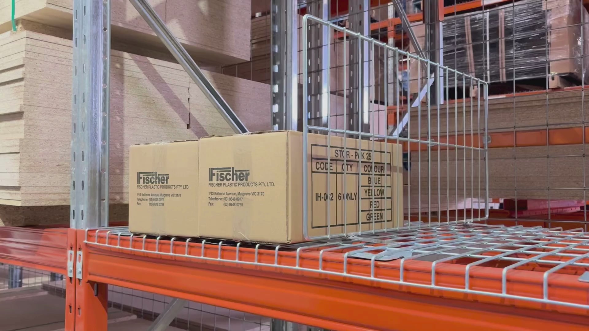 Close-up of a pallet racking wire mesh divider securely mounted onto wire mesh decking for organised warehouse storage separation.